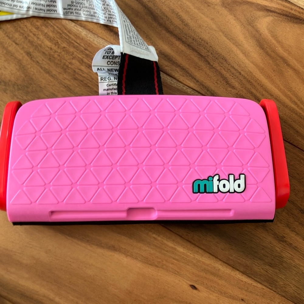 Mifold travel booster seat